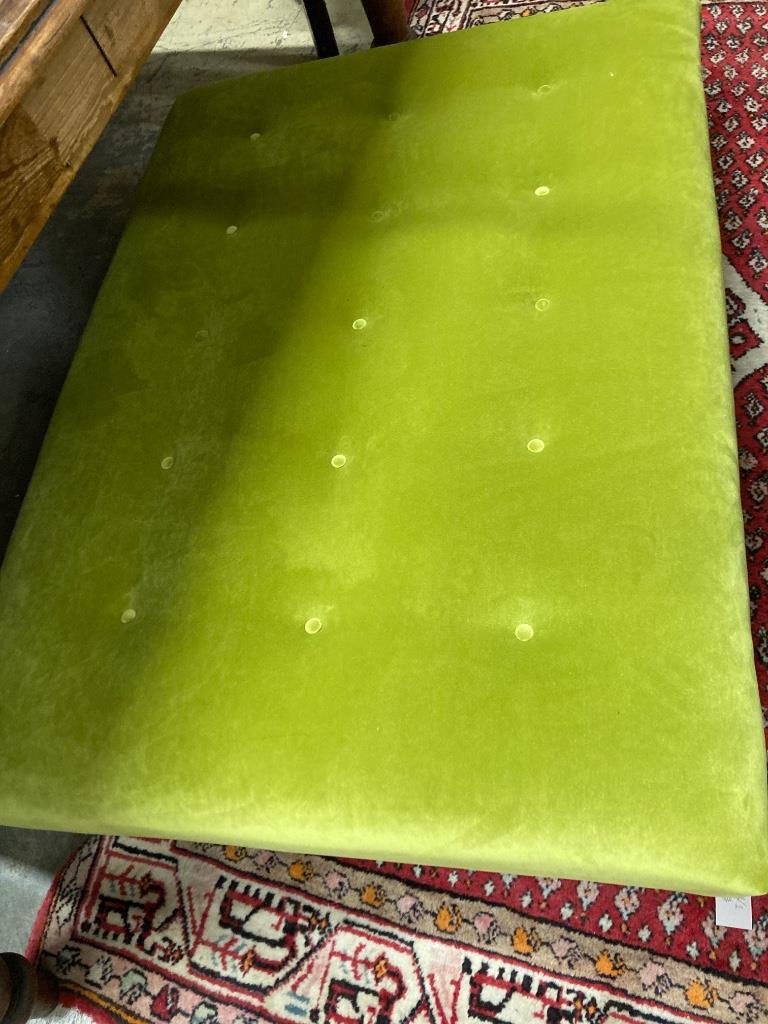 A contemporary Omega Italian velvet footstool, length 124cm, depth 88cm, height 24cm